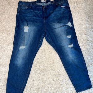 Size 32W mid rise stretch distressed jeans